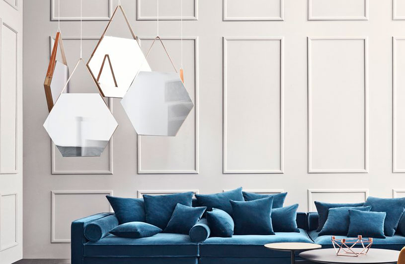Espejos modernos para decorar el hogar, el estilo colgante llena el espacio con un reflejo cambiante
